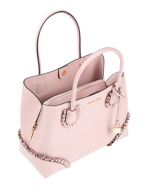 michael kors light pink handbag|Michael Kors pink hand bag.